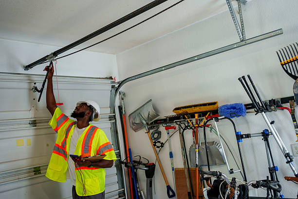 Professional Garage Door Panel Replacement technician working in Wolcott, IN